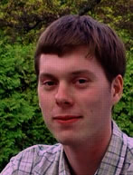 mug shot of Eric in front of a hedge, 12kb
